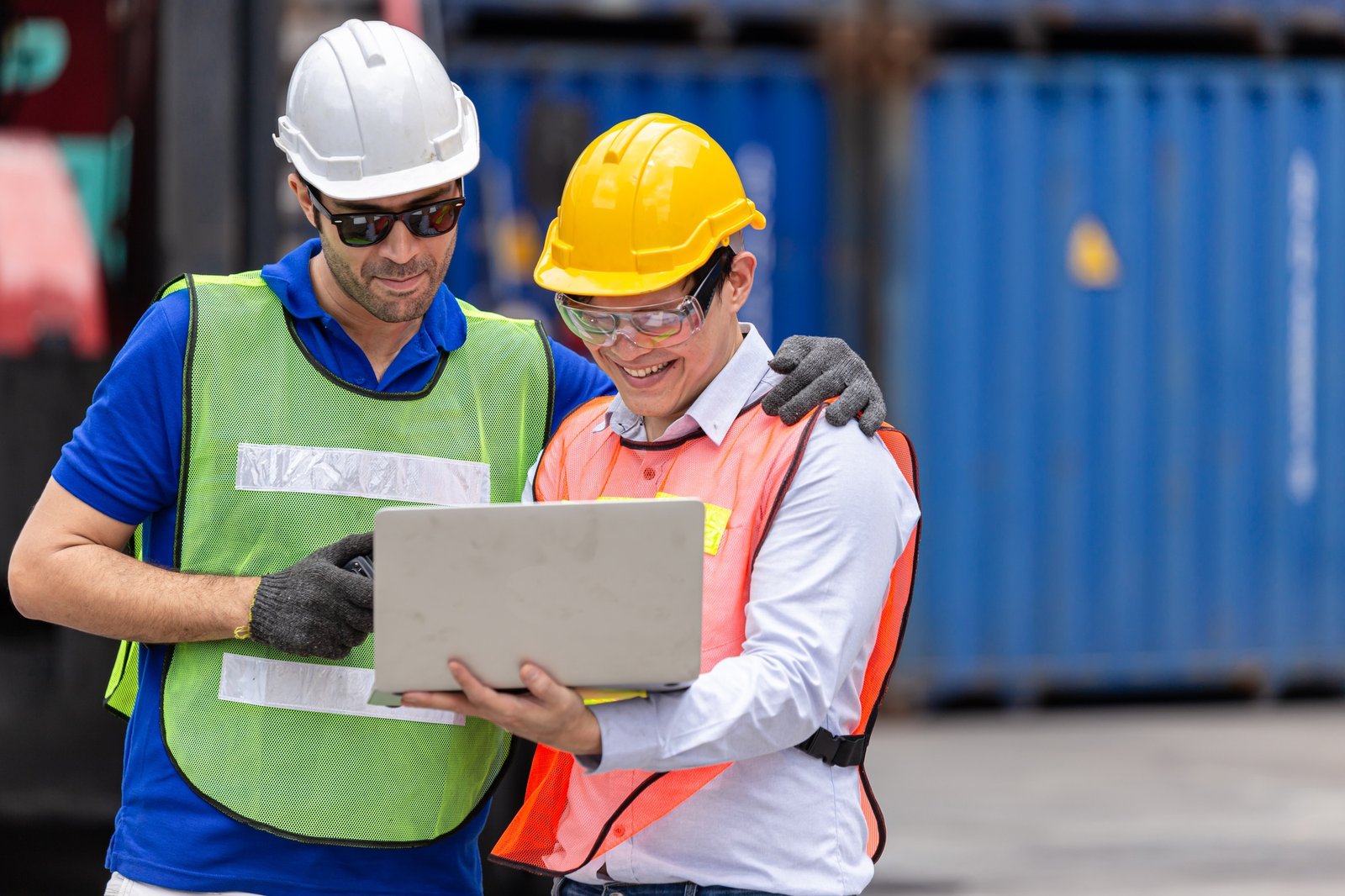 Happy engineer worker enjoy working together, Help support friend at work in logistic industry.